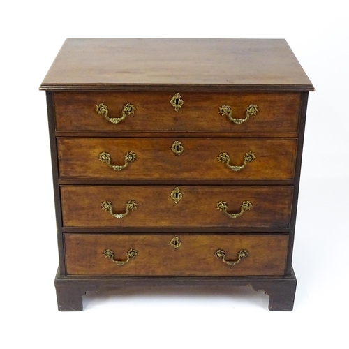 1484 - A late 18thC mahogany bachelors chest of drawers, the chest of drawers comprising four long drawers ... 