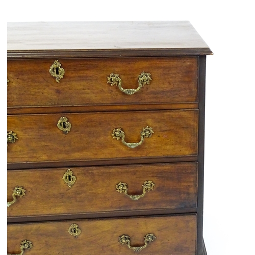 1484 - A late 18thC mahogany bachelors chest of drawers, the chest of drawers comprising four long drawers ... 