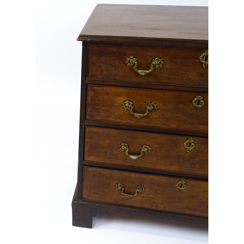 1484 - A late 18thC mahogany bachelors chest of drawers, the chest of drawers comprising four long drawers ... 