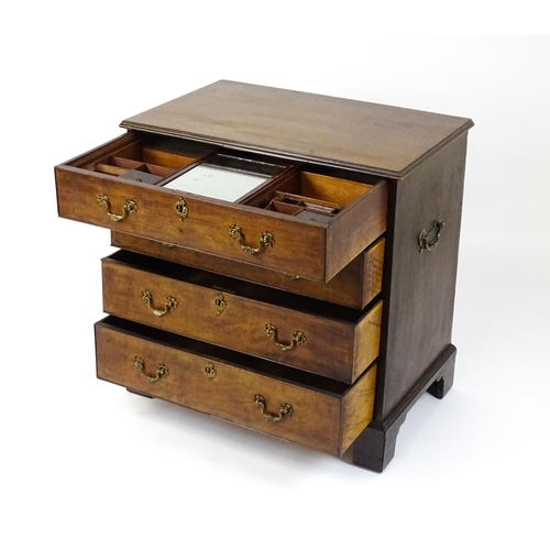 1484 - A late 18thC mahogany bachelors chest of drawers, the chest of drawers comprising four long drawers ... 