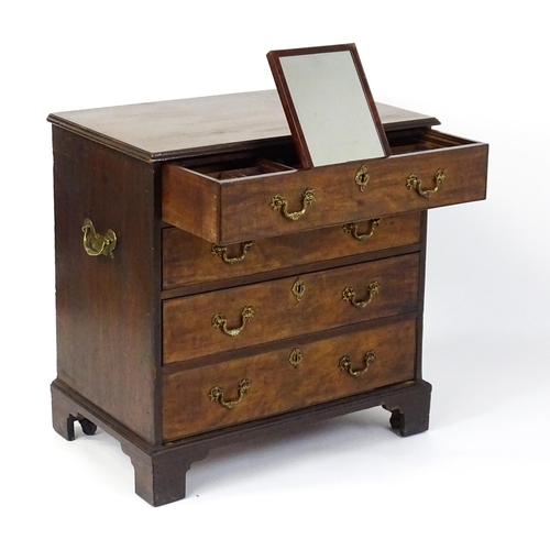 1484 - A late 18thC mahogany bachelors chest of drawers, the chest of drawers comprising four long drawers ... 