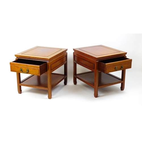 1511 - A pair of Chinese style side tables, each with a single short drawer, moulded under tier and raised ... 