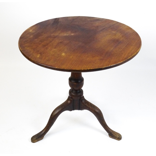 1518 - A late 18thC tripod table with a mahogany top above a turned oak pedestal and three cabriole legs. 2... 