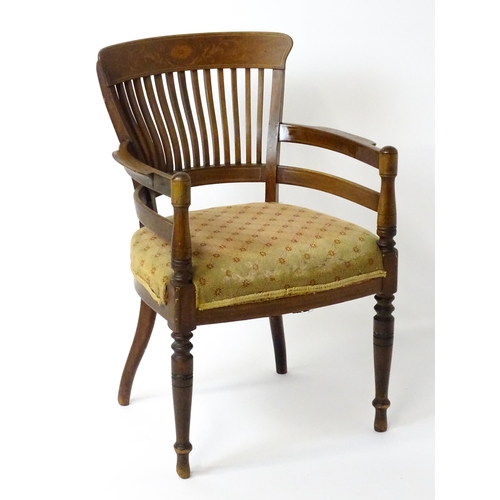 1517 - A late 19thC Armchair designed by E.W Godwin for James Peddle. The chair having a marquetry inlaid b... 