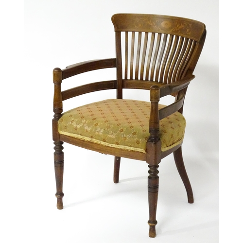 1517 - A late 19thC Armchair designed by E.W Godwin for James Peddle. The chair having a marquetry inlaid b... 