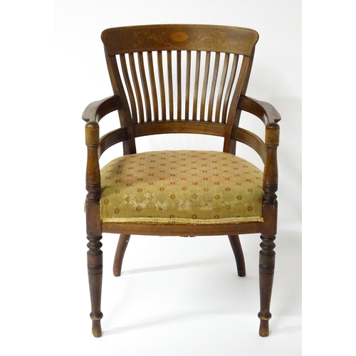 1517 - A late 19thC Armchair designed by E.W Godwin for James Peddle. The chair having a marquetry inlaid b... 