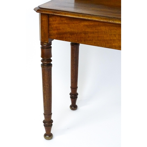 1531 - A 19thC ecclesiastical Gothic side table, with a pointed back stand having pierced trefoil decoratio... 