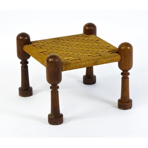 1535 - A mid 20thC Anglo-Indian style stool with four turned rosewood legs and a woven seat. 18