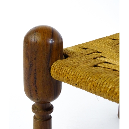 1535 - A mid 20thC Anglo-Indian style stool with four turned rosewood legs and a woven seat. 18