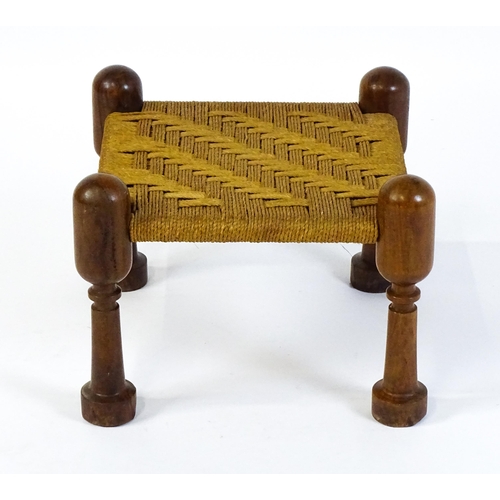 1535 - A mid 20thC Anglo-Indian style stool with four turned rosewood legs and a woven seat. 18