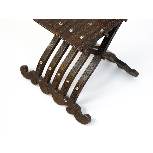 1542 - A late 19thC Moorish style folding chair with mother of pearl decoration. 15