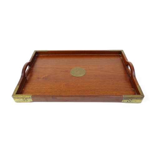 1094 - Three 20thC Oriental graduated hardwood trays with brass mounts. Largest approx. 20 1/4