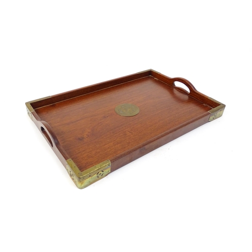 1094 - Three 20thC Oriental graduated hardwood trays with brass mounts. Largest approx. 20 1/4