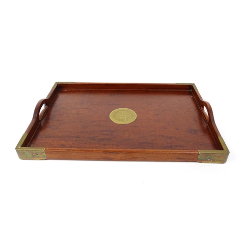 1094 - Three 20thC Oriental graduated hardwood trays with brass mounts. Largest approx. 20 1/4