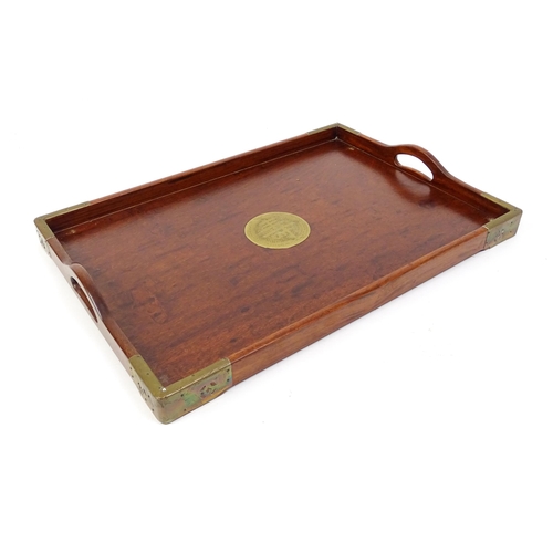 1094 - Three 20thC Oriental graduated hardwood trays with brass mounts. Largest approx. 20 1/4