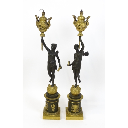 1234 - A large pair of 19thC cast bronze sculptural lamps, each modelled as a Classical female figure holdi... 