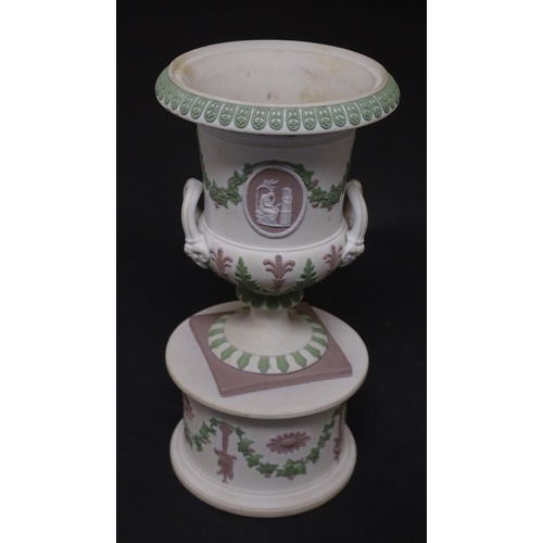 92 - A pair of Samuel Alcock bisque / parian ewers with decorated with encrusted flowers and relief bunch... 