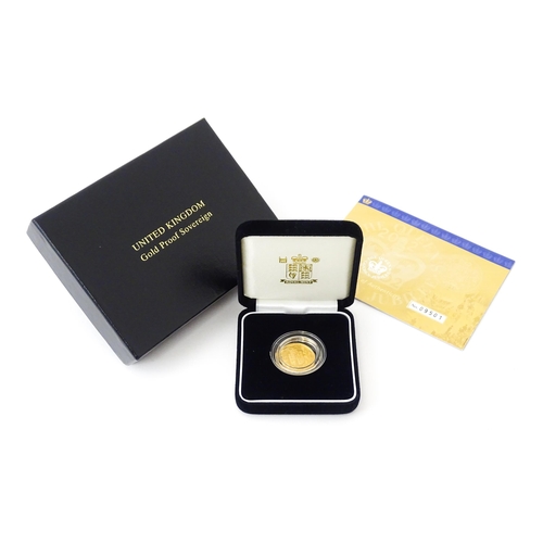 805 - Coin : An Elizabeth II 2002 gold proof sovereign. With box and certificate.