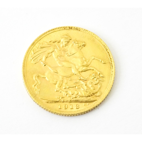 810 - Coin : A George V 1913 gold sovereign