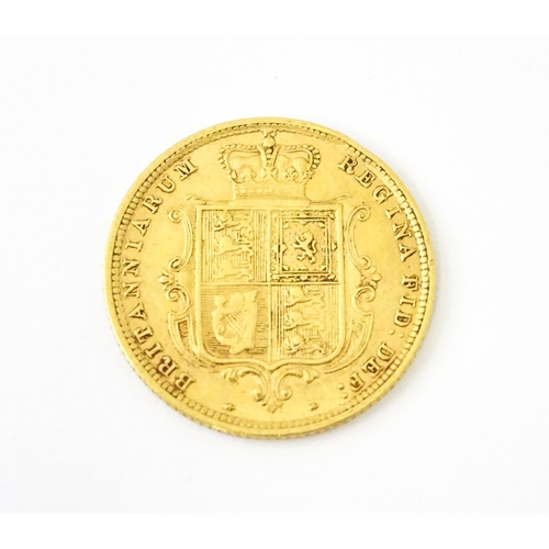 813 - Coin : A Victoria 1885 gold half sovereign