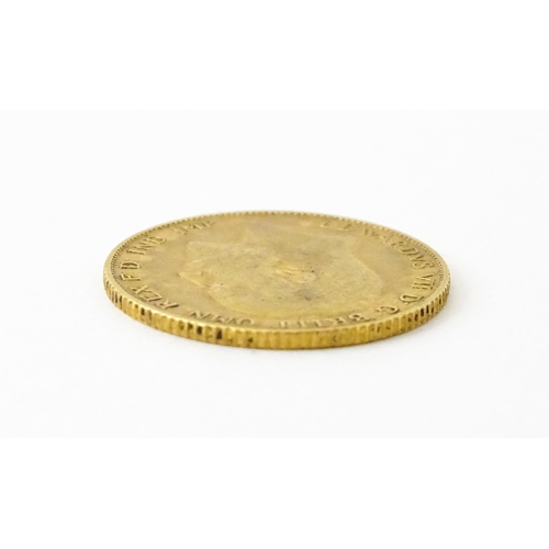 814 - Coin : An Edward VII 1909 gold half sovereign