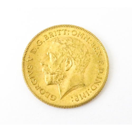 815 - Coin : A George V 1912 gold half sovereign