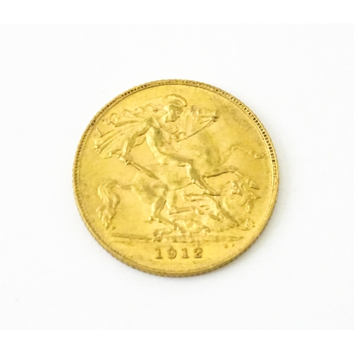 815 - Coin : A George V 1912 gold half sovereign