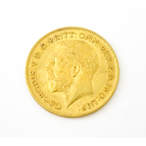 816 - Coin : A George V 1911 gold half sovereign