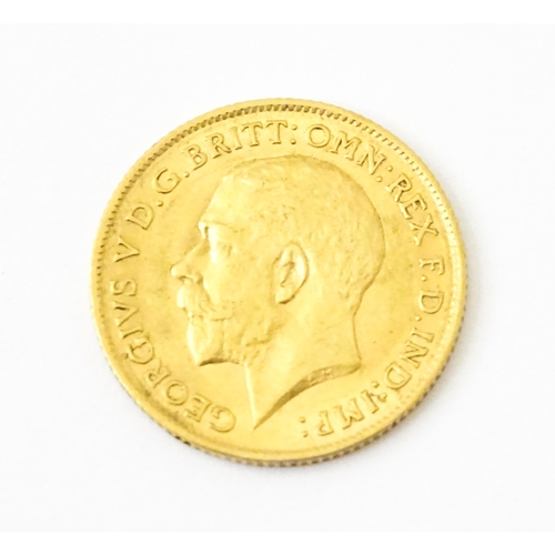 817 - Coin : A George 1912 gold half sovereign