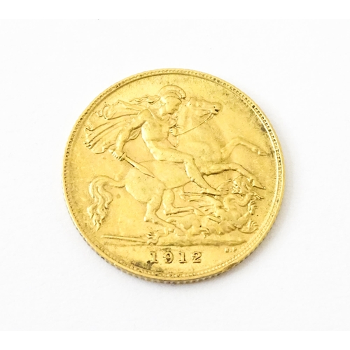 817 - Coin : A George 1912 gold half sovereign