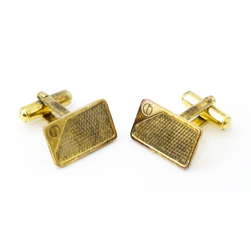 782 - A cased pair of silver gilt cufflinks by Dunhill hallmarked London 1983, maker Alfred Dunhill & Sons... 