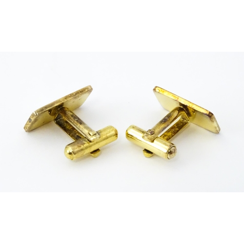 782 - A cased pair of silver gilt cufflinks by Dunhill hallmarked London 1983, maker Alfred Dunhill & Sons... 