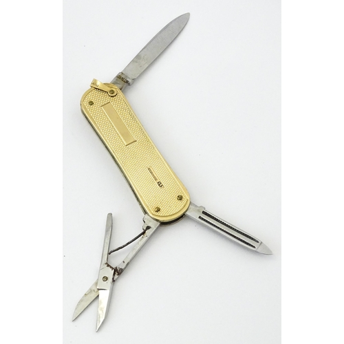 786 - A 9ct gold penknife hallmarked Birmingham 1960, maker Cohen & Charles. Approx. 2 1/2