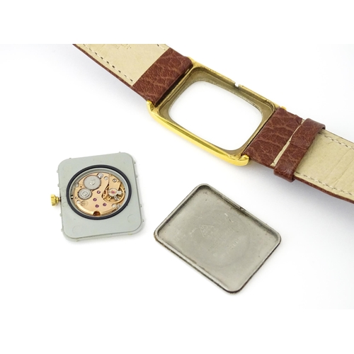 789 - A vintage gentleman's Omega manual wind wristwatch, the gold plated case with enamel dial signed 'Om... 