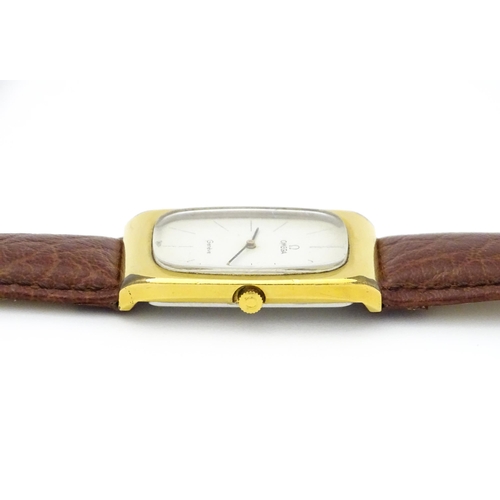 789 - A vintage gentleman's Omega manual wind wristwatch, the gold plated case with enamel dial signed 'Om... 