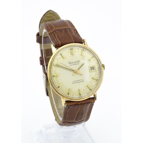 792 - A vintage 9ct gold cased gentleman's Accurist automatic shock master wristwatch, hallmarked Edinburg... 