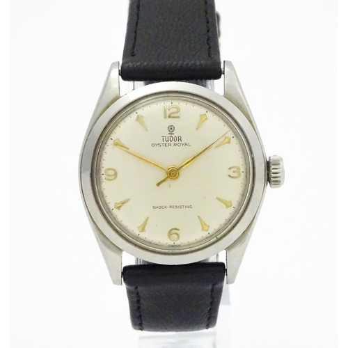 794 - A gentleman's Tudor wristwatch, the dial signed Tudor Oyster Royal Shock-Resisting, the back of the ... 