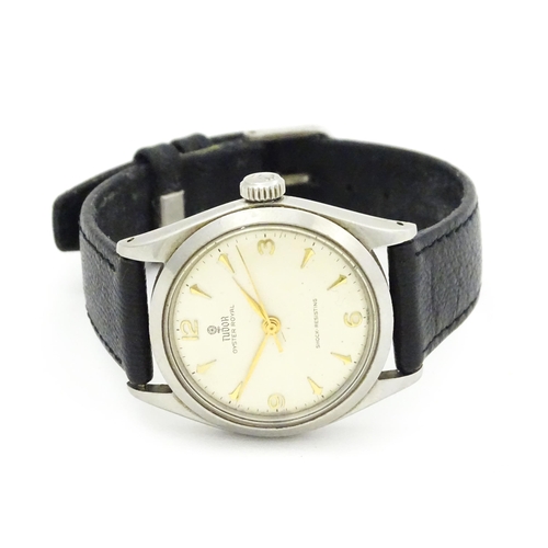 794 - A gentleman's Tudor wristwatch, the dial signed Tudor Oyster Royal Shock-Resisting, the back of the ... 