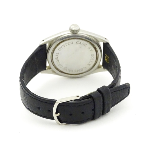 794 - A gentleman's Tudor wristwatch, the dial signed Tudor Oyster Royal Shock-Resisting, the back of the ... 