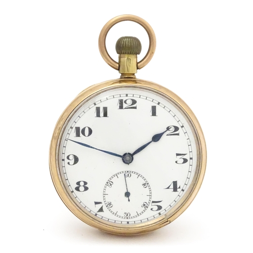 799 - A 9ct gold cased top wind pocket watch, with Arabic numerals and subsidiary seconds dial. The case b... 