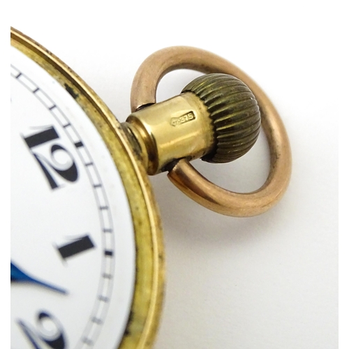 799 - A 9ct gold cased top wind pocket watch, with Arabic numerals and subsidiary seconds dial. The case b... 