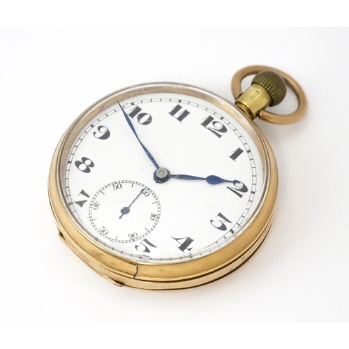 799 - A 9ct gold cased top wind pocket watch, with Arabic numerals and subsidiary seconds dial. The case b... 