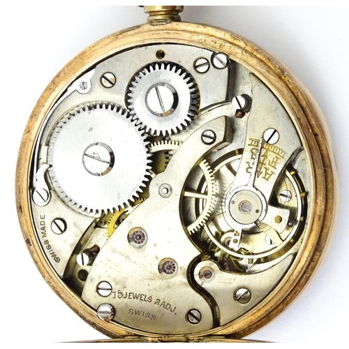 799 - A 9ct gold cased top wind pocket watch, with Arabic numerals and subsidiary seconds dial. The case b... 