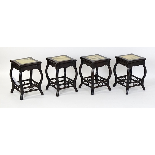 1443 - A mah-jong table and stools. Having marble tops above cabriole legs and double braced stretchers wit... 