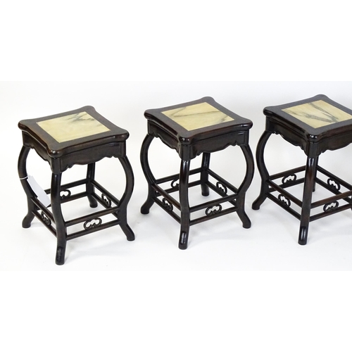 1443 - A mah-jong table and stools. Having marble tops above cabriole legs and double braced stretchers wit... 