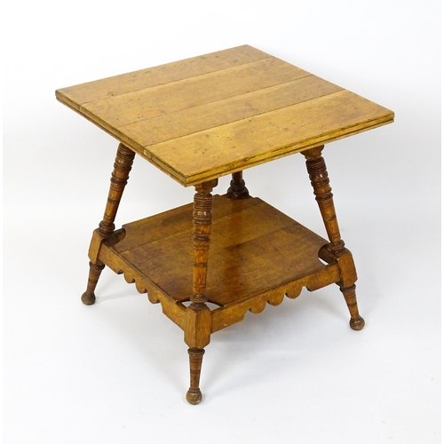 1466 - An Aesthetic movement oak table in the manner of Charles Locke Eastlake, the table having a squared ... 