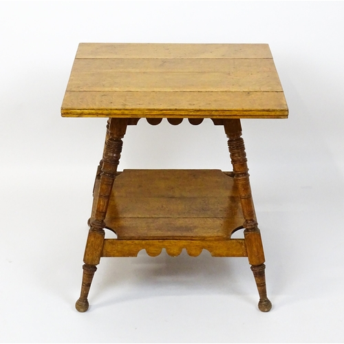 1466 - An Aesthetic movement oak table in the manner of Charles Locke Eastlake, the table having a squared ... 