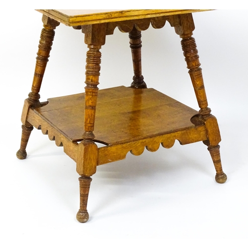 1466 - An Aesthetic movement oak table in the manner of Charles Locke Eastlake, the table having a squared ... 