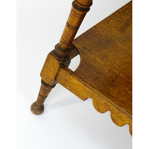 1466 - An Aesthetic movement oak table in the manner of Charles Locke Eastlake, the table having a squared ... 