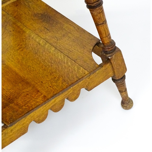 1466 - An Aesthetic movement oak table in the manner of Charles Locke Eastlake, the table having a squared ... 